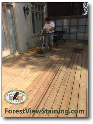 sanding a cedar wood deck